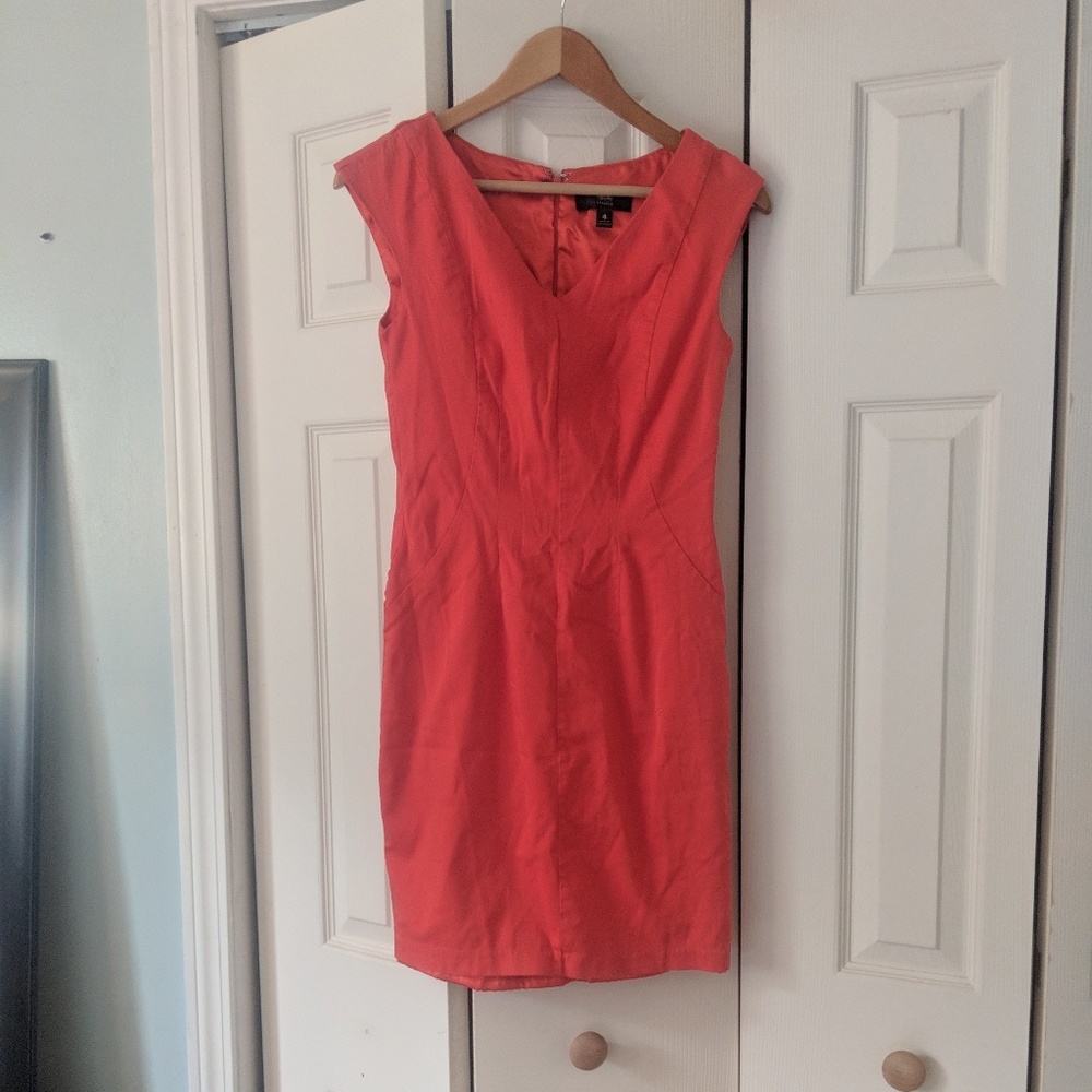 Red dress with a hint of orange.